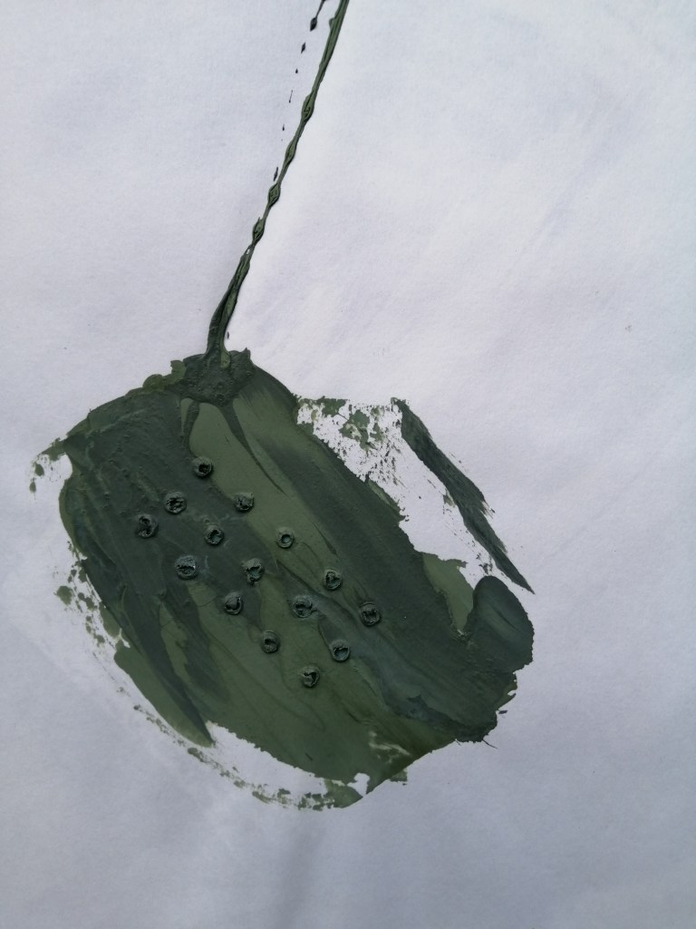 pierced paper and ink drawing